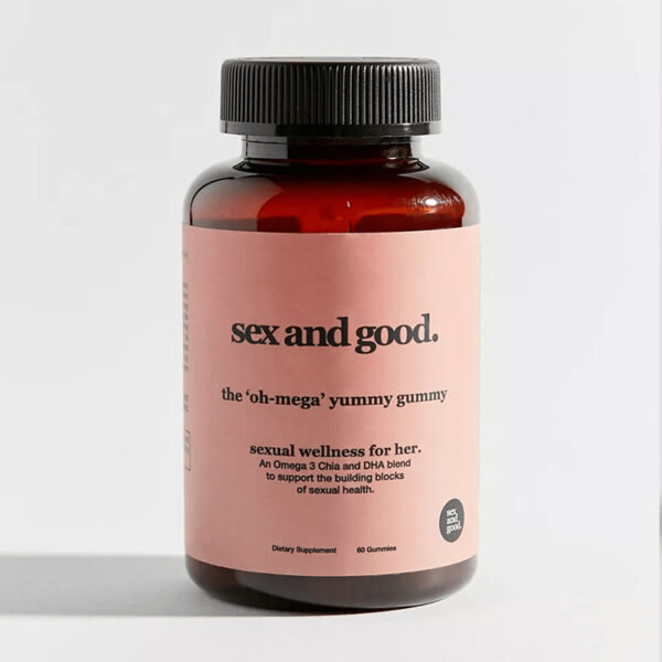 A bottle of "Oh-Mega Yummy Gummy" supplements, labeled for sexual health and energy, with colorful gummies spilling out.